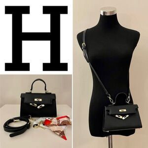 With a Designer Logo mini Sellier 20 handbag.